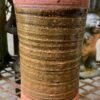 green ceramic cylinder vase.