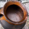 Rustieke donkerbruine aardewerken pot met handvat | Rustic dark‑brown earthenware pot, 1890