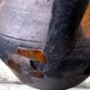 Rustieke donkerbruine aardewerken pot met handvat | Rustic dark‑brown earthenware pot, 1890