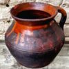 Rustieke donkerbruine aardewerken pot met handvat | Rustic dark‑brown earthenware pot, 1890