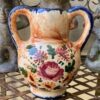 Vintage majolica bulb vase signed Robbia with blue handles and floral décor