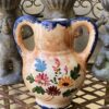 Vintage majolica bulb vase signed Robbia with blue handles and floral décor