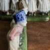 Antieke polychrome porseleinen boerenkinderen in Hollandse klederdracht – Antique polychrome porcelain Dutch farm children – ca. 1900