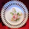 Set van 8 polychroom beschilderde opengewerkte porseleinen dessertbordjes | Set of 8 polychrome openwork porcelain dessert plates – ca. 20th century