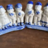 Small Delft Blue figurine with milkmaids and boys – ca. 1920 (1) Klein Delfts blauw beeldje met melkmeisjes en jongens – Small Delft Blue figurine with milkmaids and boys – ca. 1920
